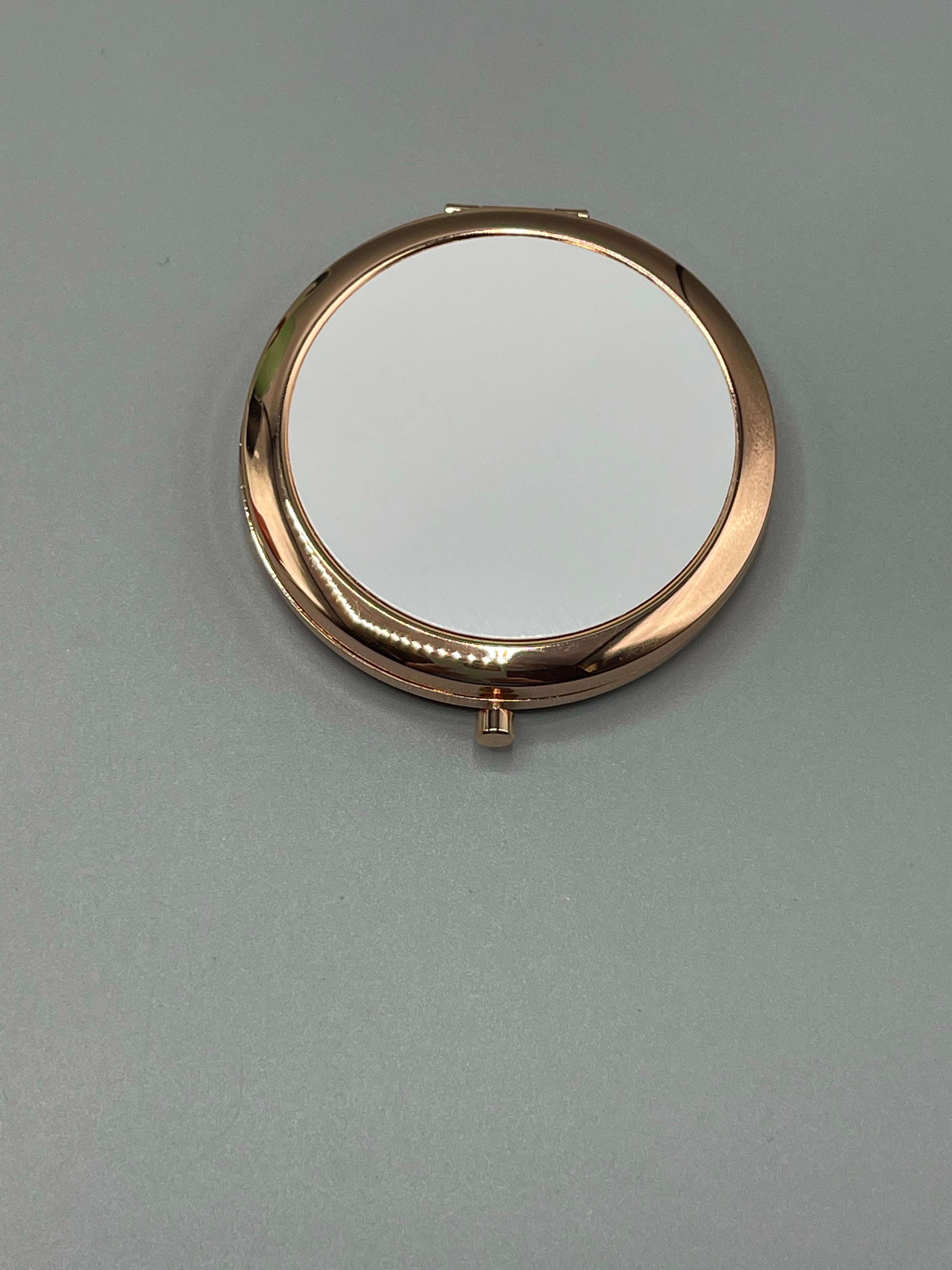 Sublimation compact mirror